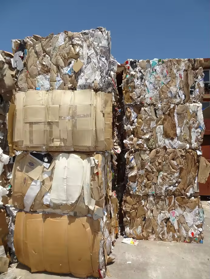 Tightly baled cardboard materials